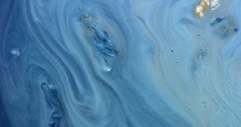 Liquid blue paint is moving