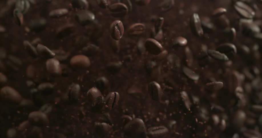 Coffee beans are tossed