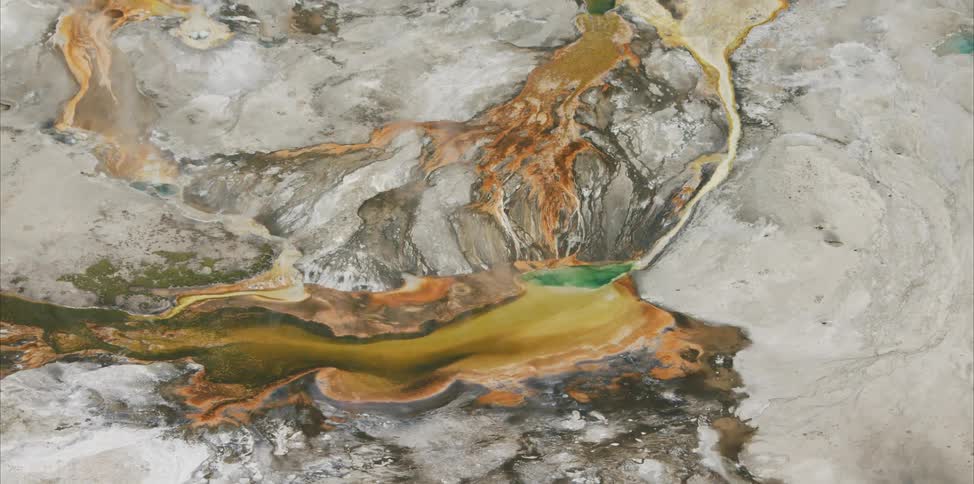 A hot spring in a rocky landscape