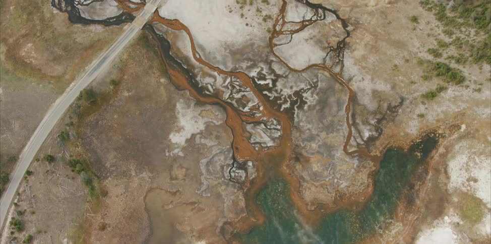 Birds eye view of water flowing over rock