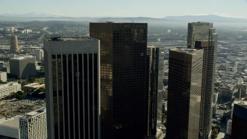 An aerial view of a downtown area is displayed