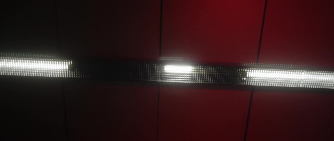 A ceiling light in a red room