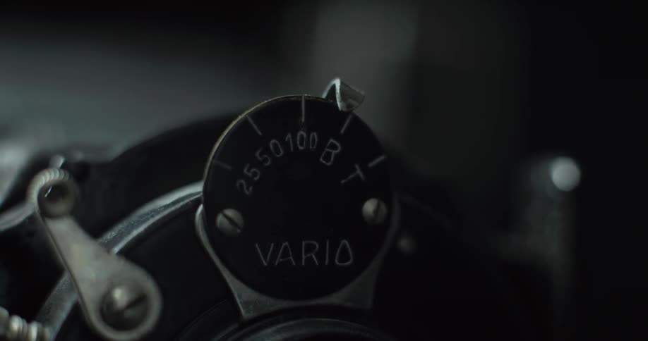 A person moves a dial