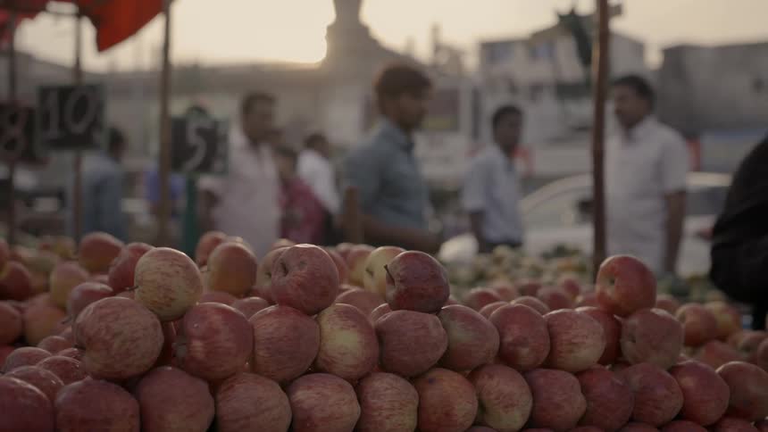 Apples stacked at a street market