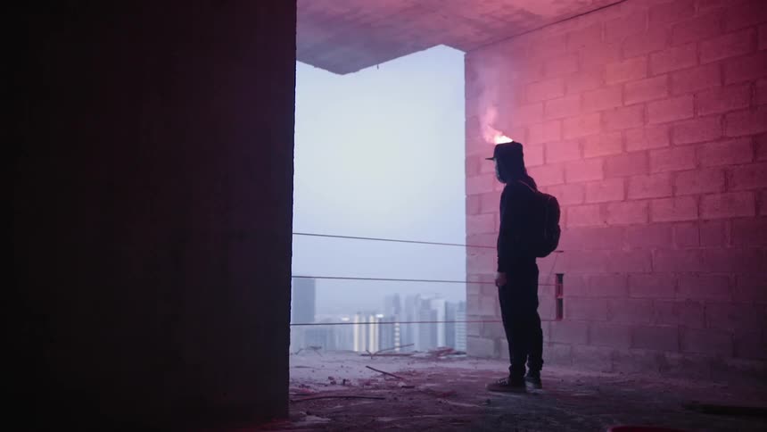 Man With Flare In High Rise