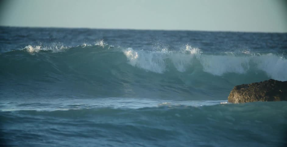 Waves rolling in towards the coast