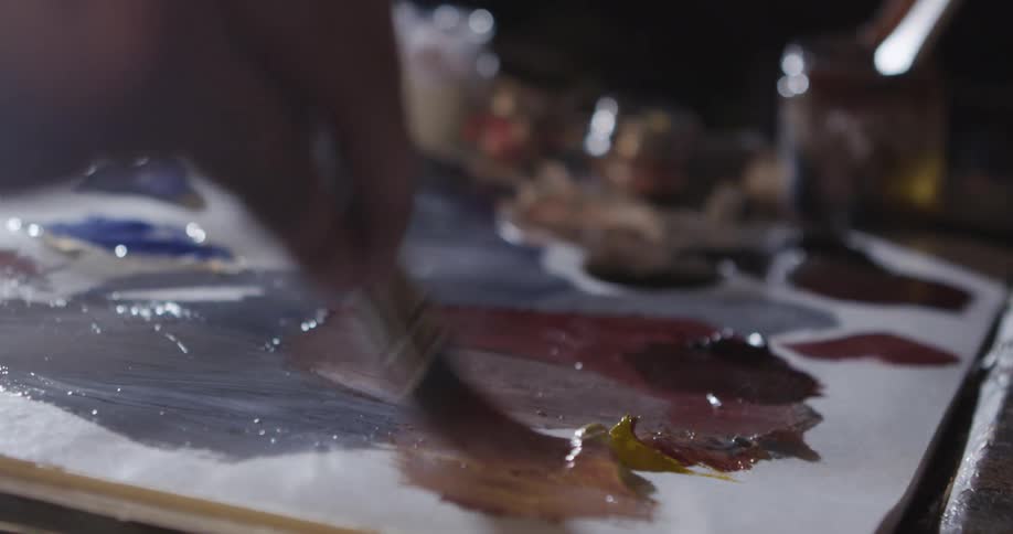 Man Painting On Canvas