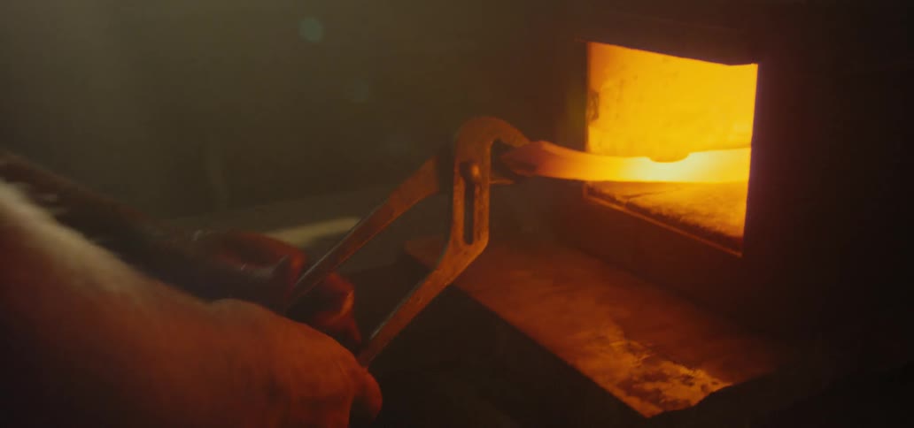 A blacksmith at work smithing