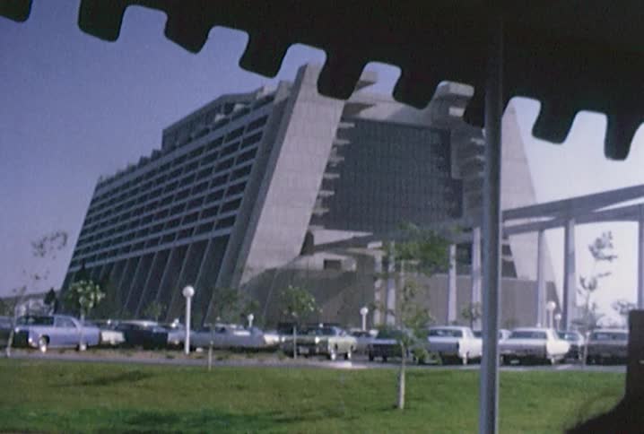 Shuttling past a building shaped like a triangle