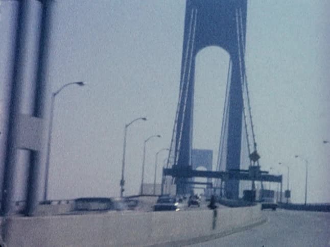 Driving down a bridge on a clear day