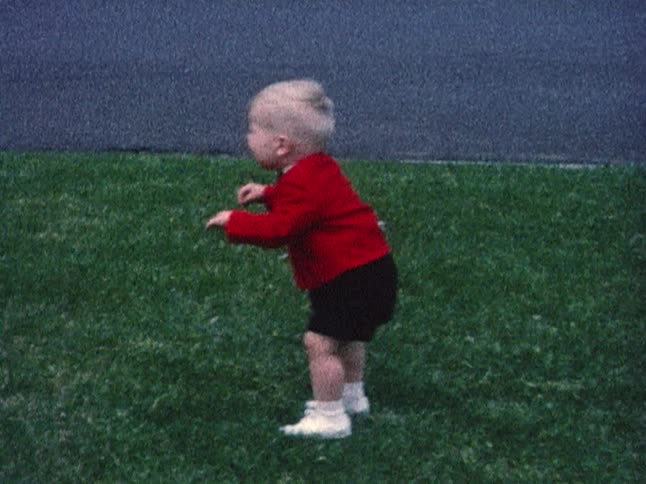 Toddler standing and crying in distress
