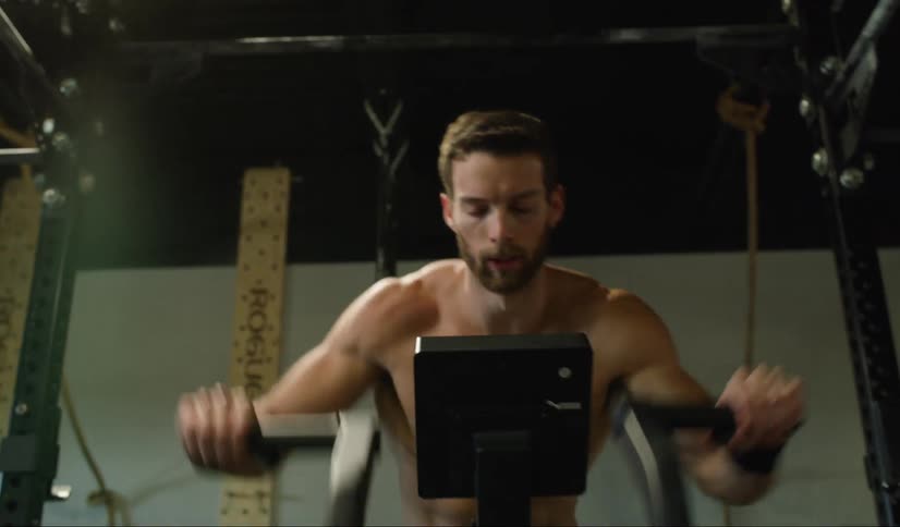 A man exercising on a exercise machine