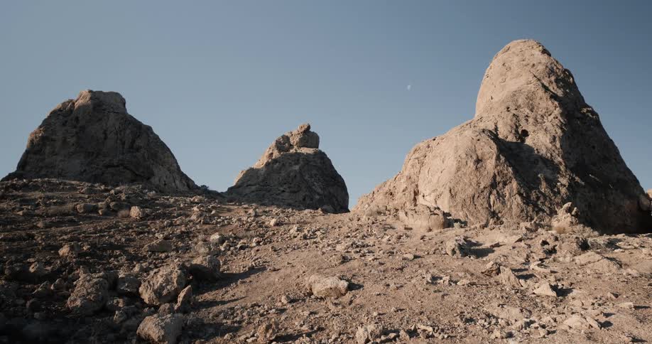A desert with rocks and mounds