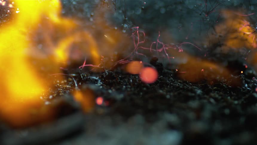 Gunpowder burning on the ground after fireworks show