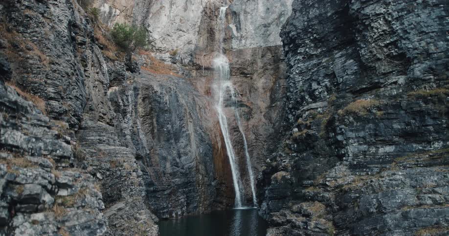 A rocky waterfall in the daytime