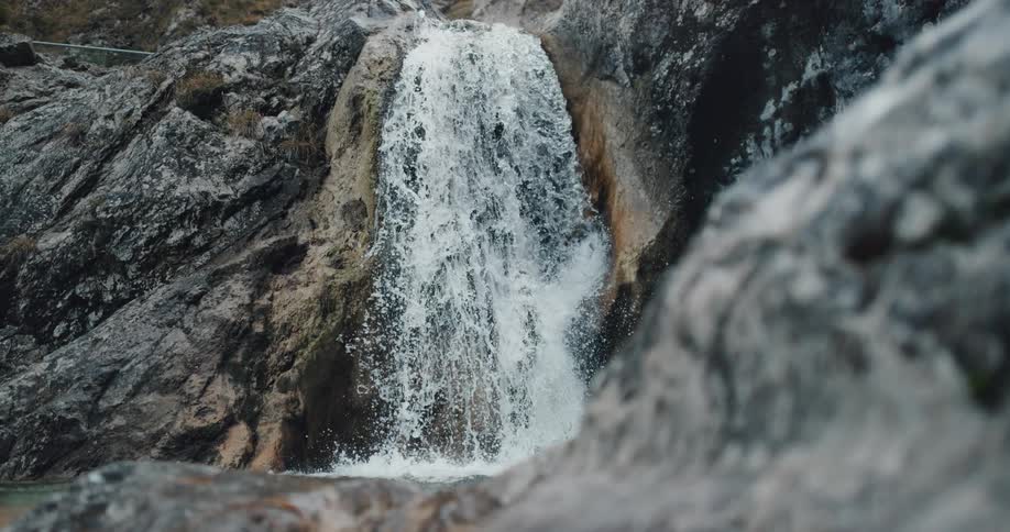A waterfall rushing down a steep cliff