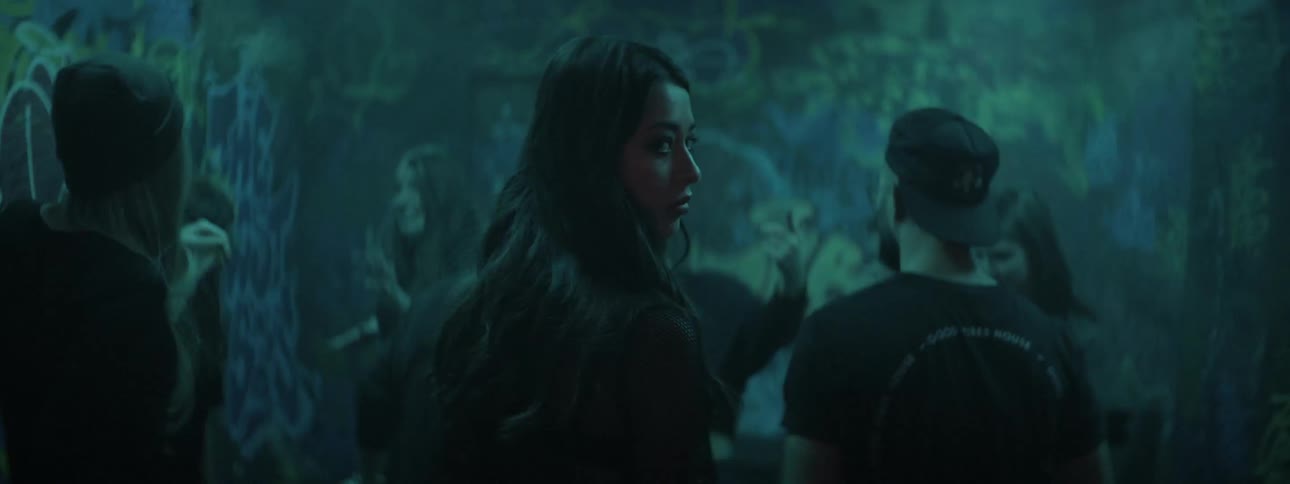 Woman enters a party at night club