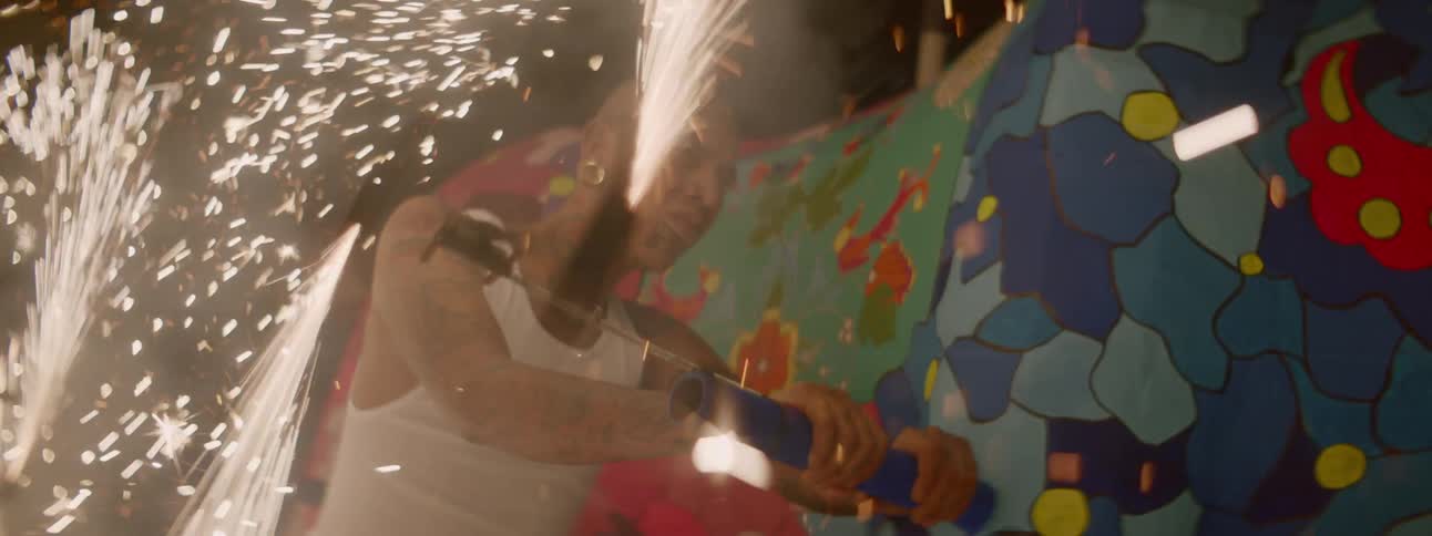 A spinner shoots flames as it spins