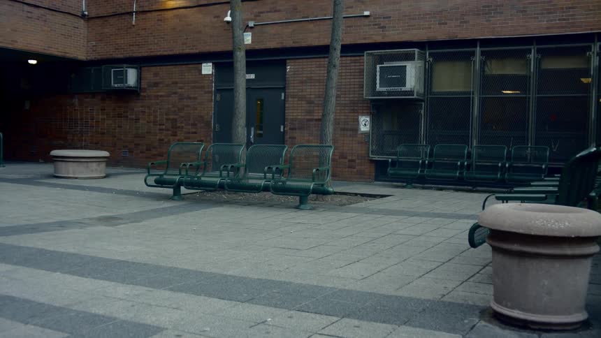 The square before the building is empty