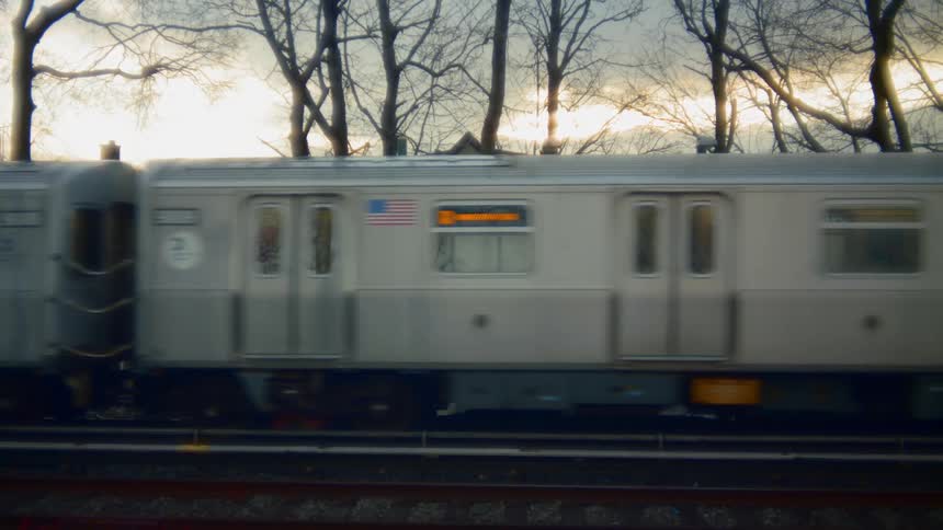 A train is moving on the train tracks