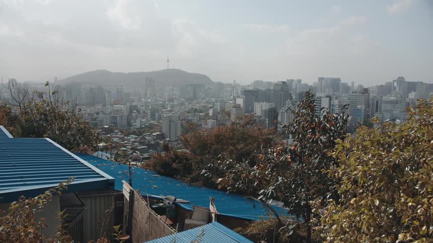 Clouds hang over a metropolitan city