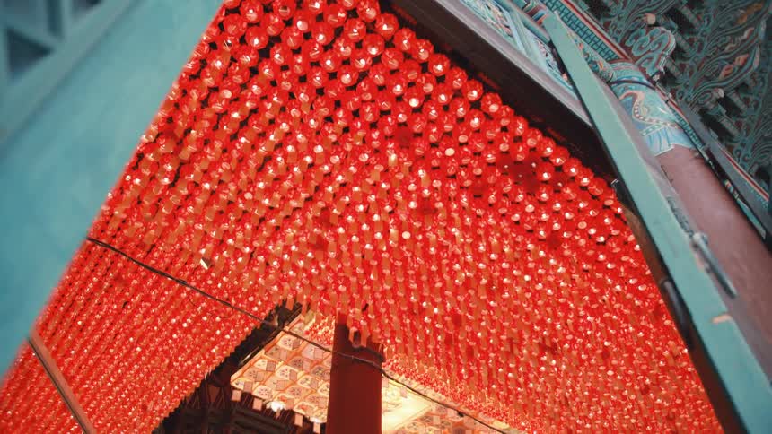 The intricately detailed ceiling and interior of a temple