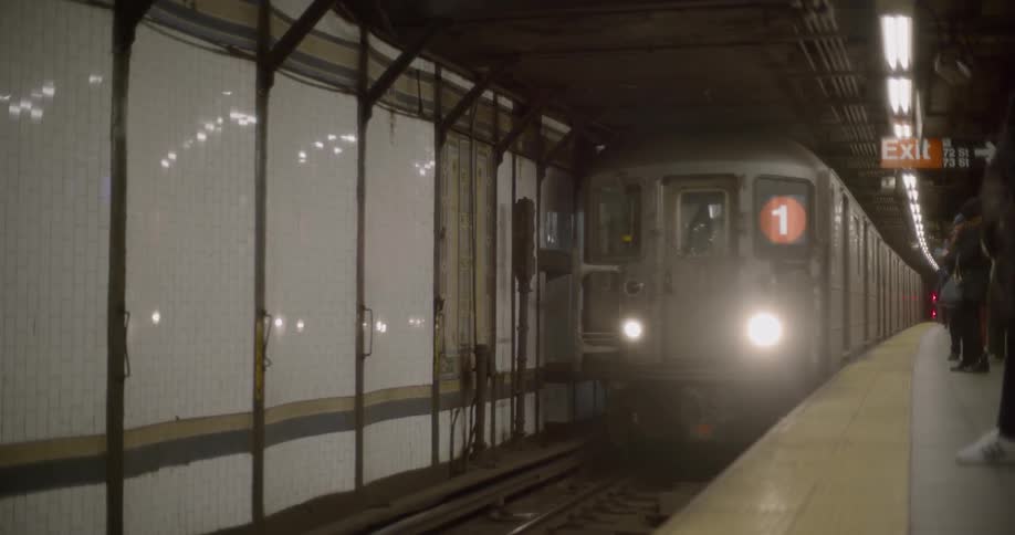 A train pulls up to a station