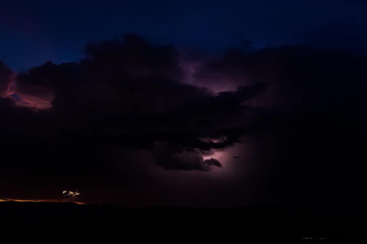 Timelapse of thunderstorm from dusk to night
