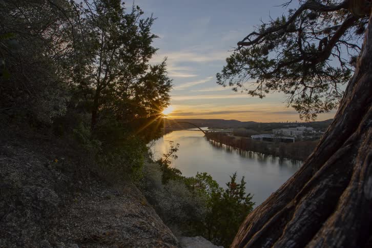 Time lapse of sunrise over river valley
