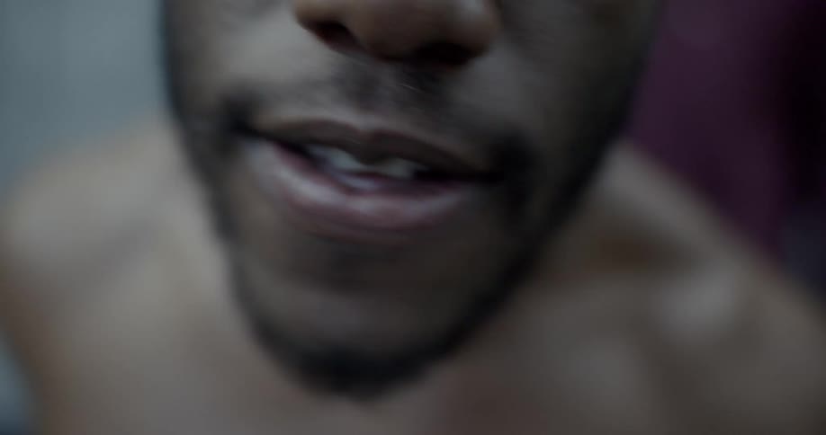 A man speaking aggressively into the camera