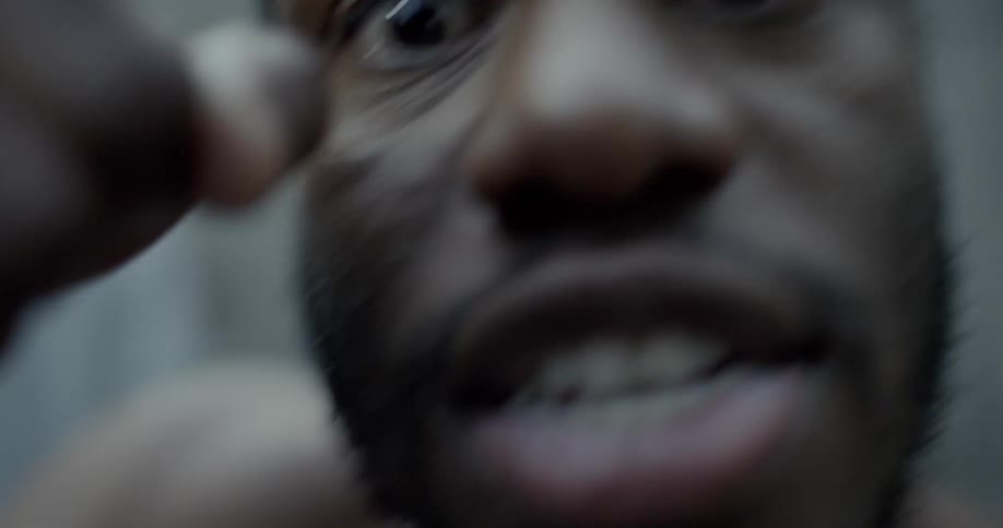 A man angrily yells and gets aggressive