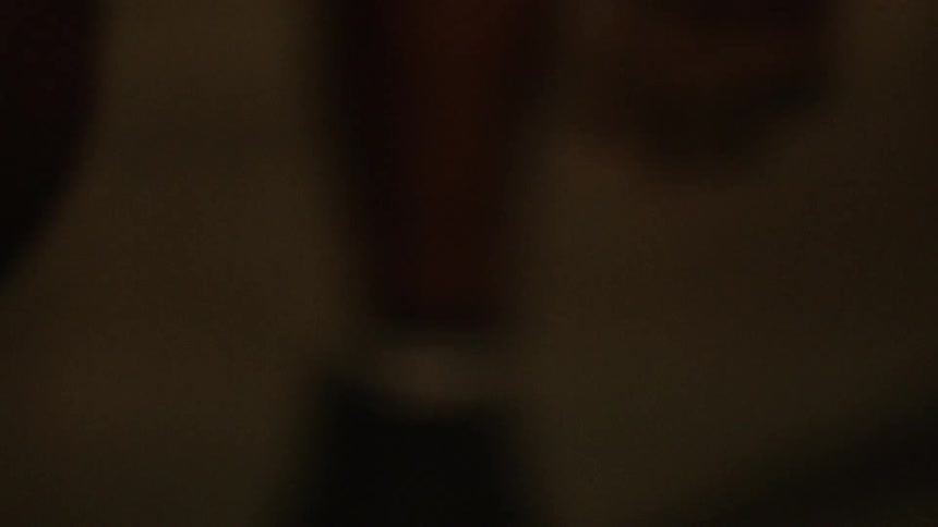 Close up of man dribbling basketball out of focus