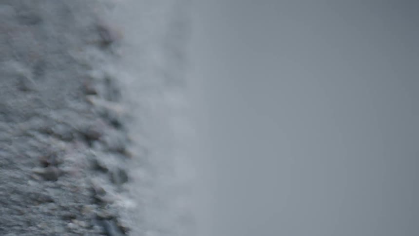 Focus blurs on textured surface and surrounding air