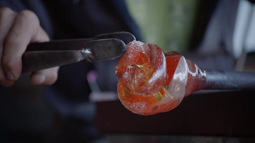 Molding hot glass