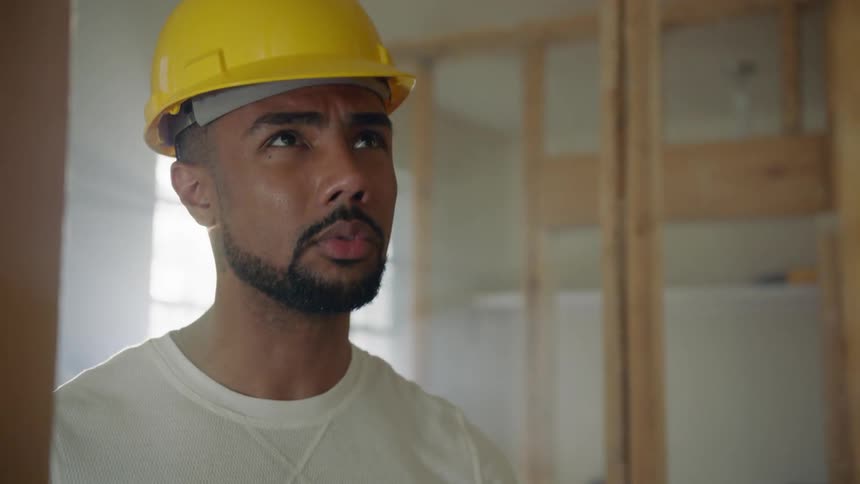 A construction works looks at framing