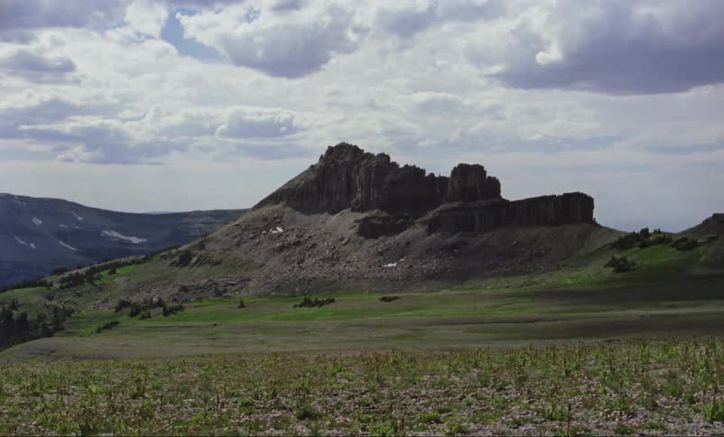 The valley has a mountain range ahead