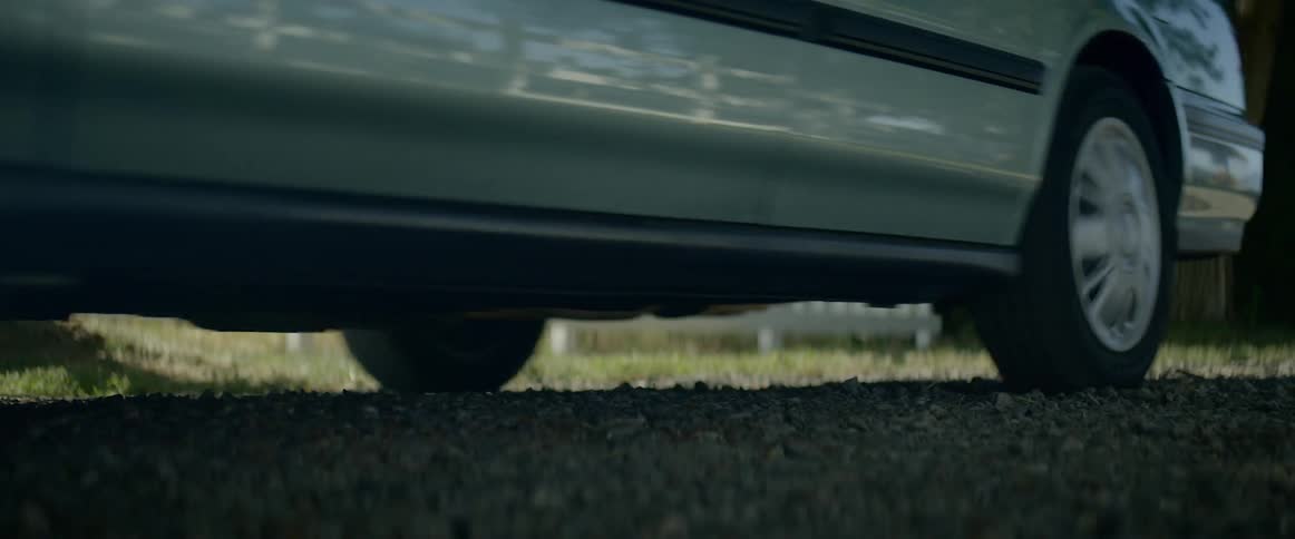 A car drives away