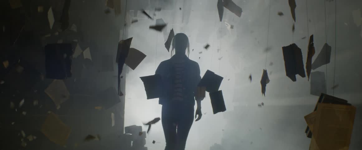 A woman walks into a dark room with floating books