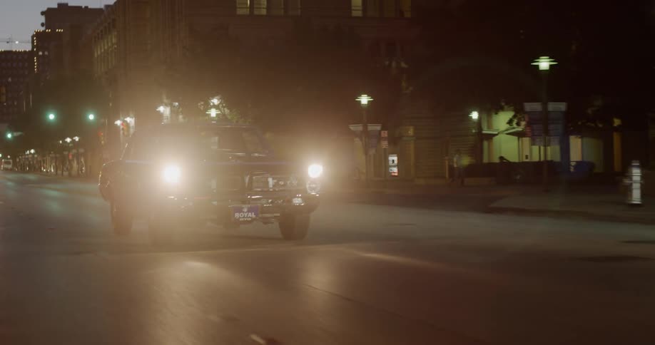 A car drives down the road