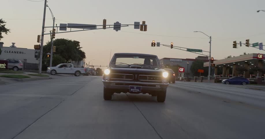 Cars drive down the road