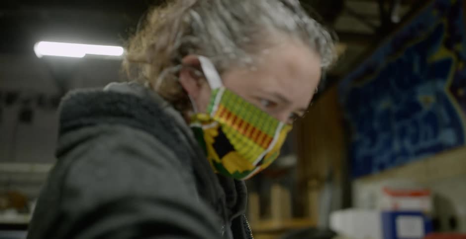 A woman pouring peroxide into a container