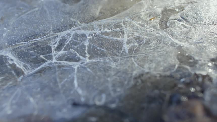 Cracks cover large relatively flat stone