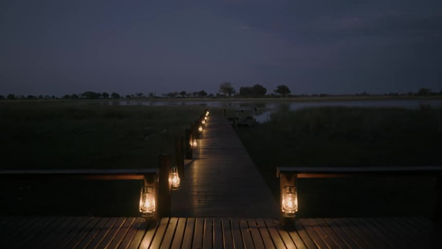 A wooden walkway leading to the coast