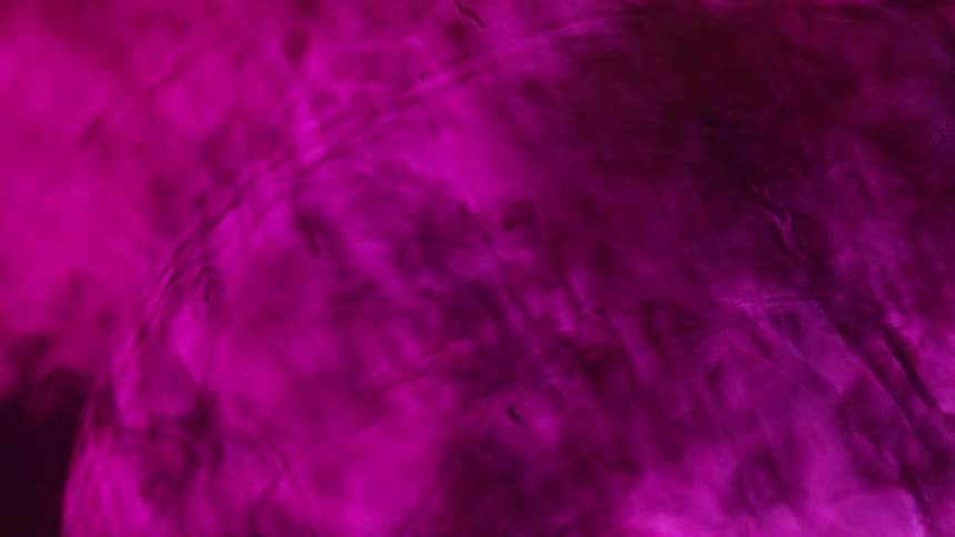 A pink water like rippling surface