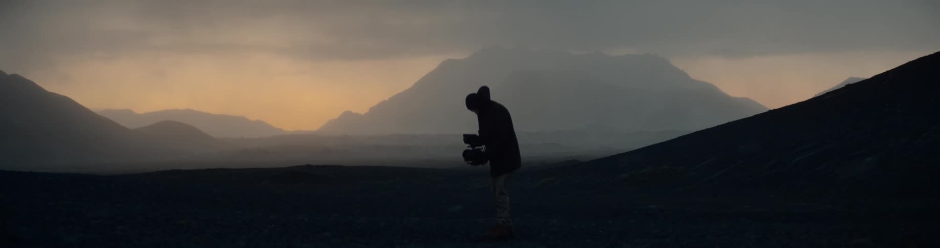 A man records outside