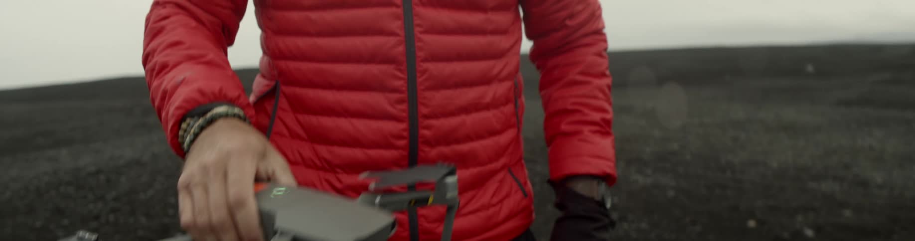 A man prepares a drone for flight