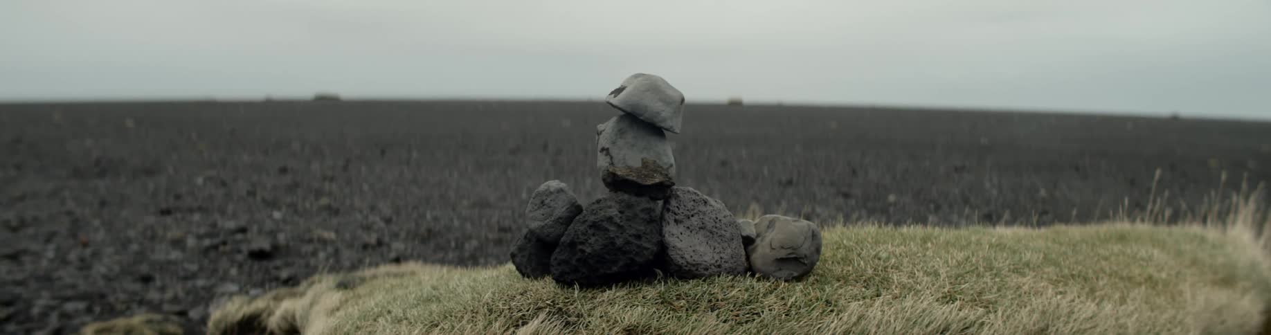Rocks are stacked on the small hill