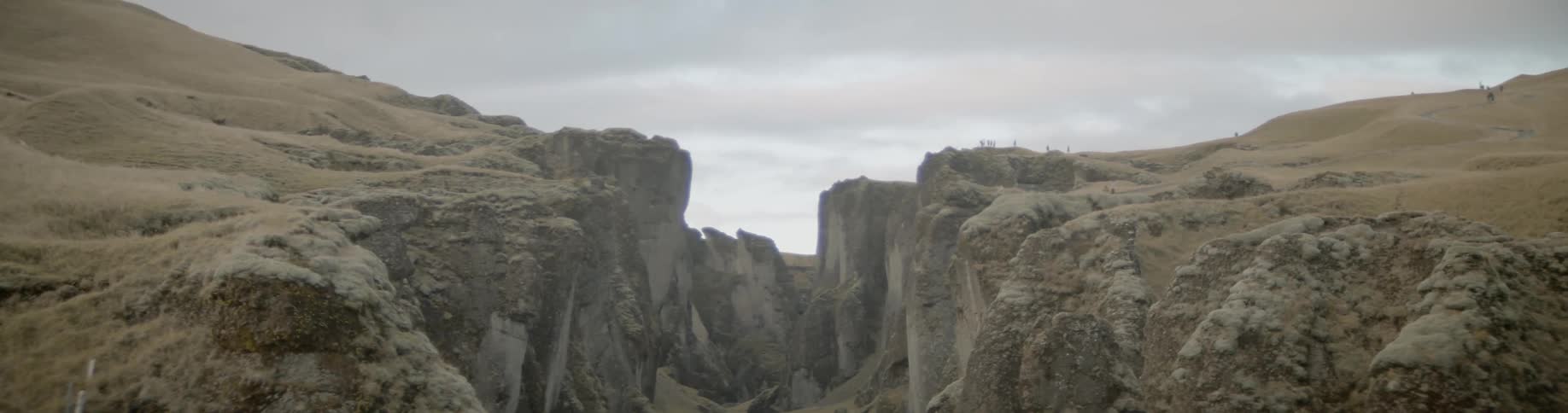 A river flowing between some cliffs