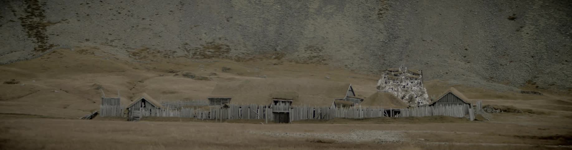 Panoramic view of rural rustic village with grass roofed houses