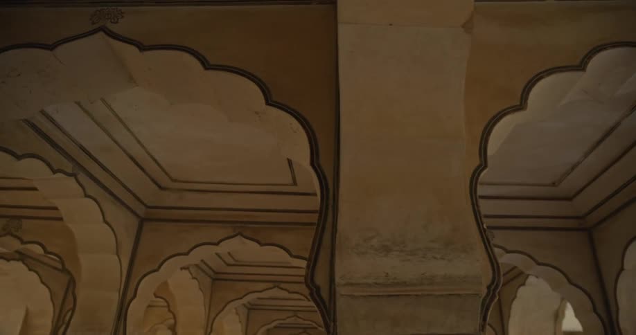 The Diwan-i-Khaas ornate white ceilings with scalloped arches at Amer Fort